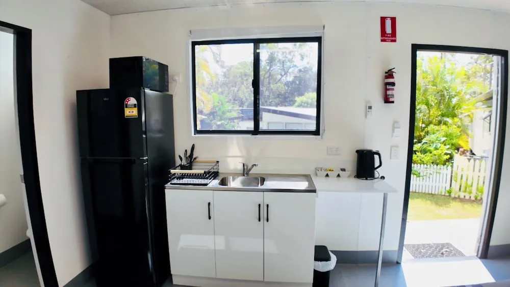 Midtown Caravan Park - Property suite and interior view